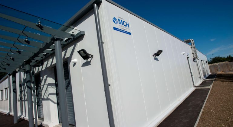 An image of ModuleCo portable medical units from the outside.